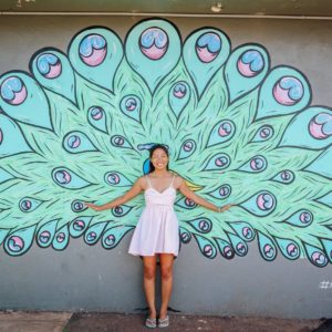 Guest with Peacock Mural in Haleiwa