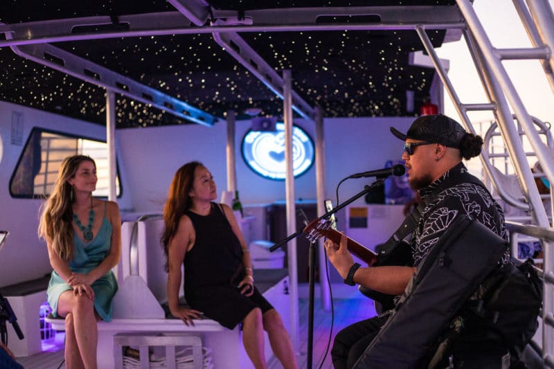 Waikiki Boat Party with live music and mood lighting