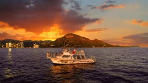 Board a Waikiki sunset dinner cruise for the best views in Oahu