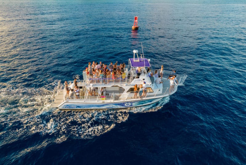 Guests enjoy a boat tour off the coast of Waikiki