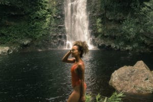Woman poses in front of most instagrammable spots in Oahu