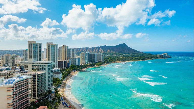 Oahu without a car - Waikiki Beach with surfers and Diamond Head